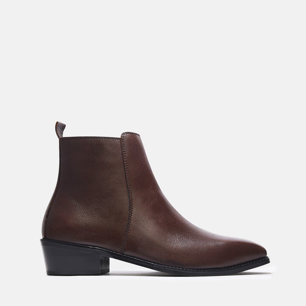 A brown, side zip leather boot with a cuban heel for men.