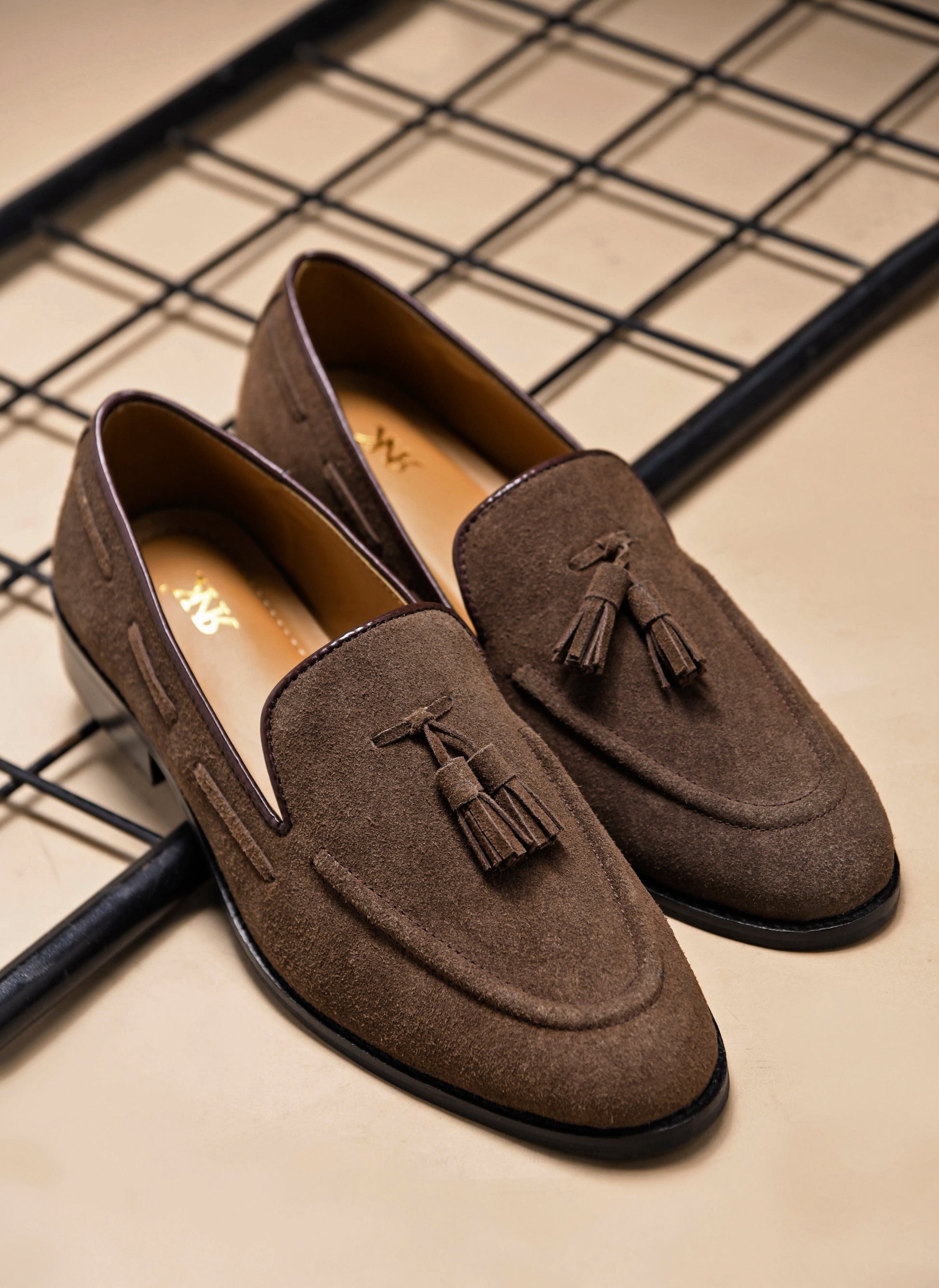Premium loafers in brown suede leather with tesel on a mid heel