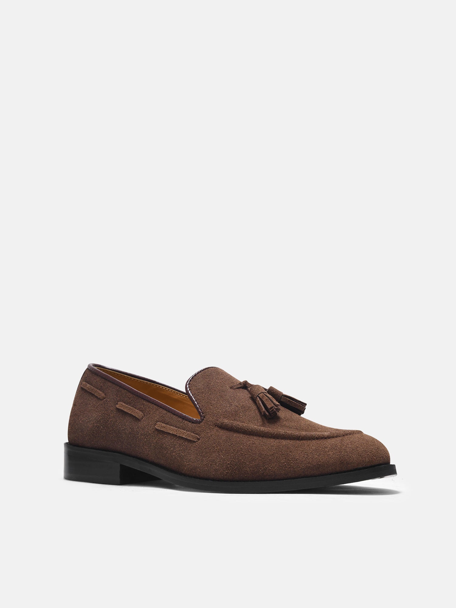 Premium loafers in brown suede leather with tesel on a mid heel