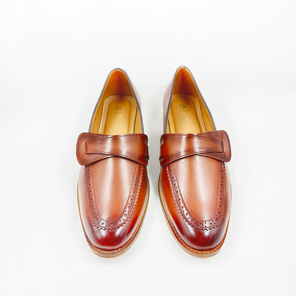 Pair of brown leather penny loafers on mid heel
