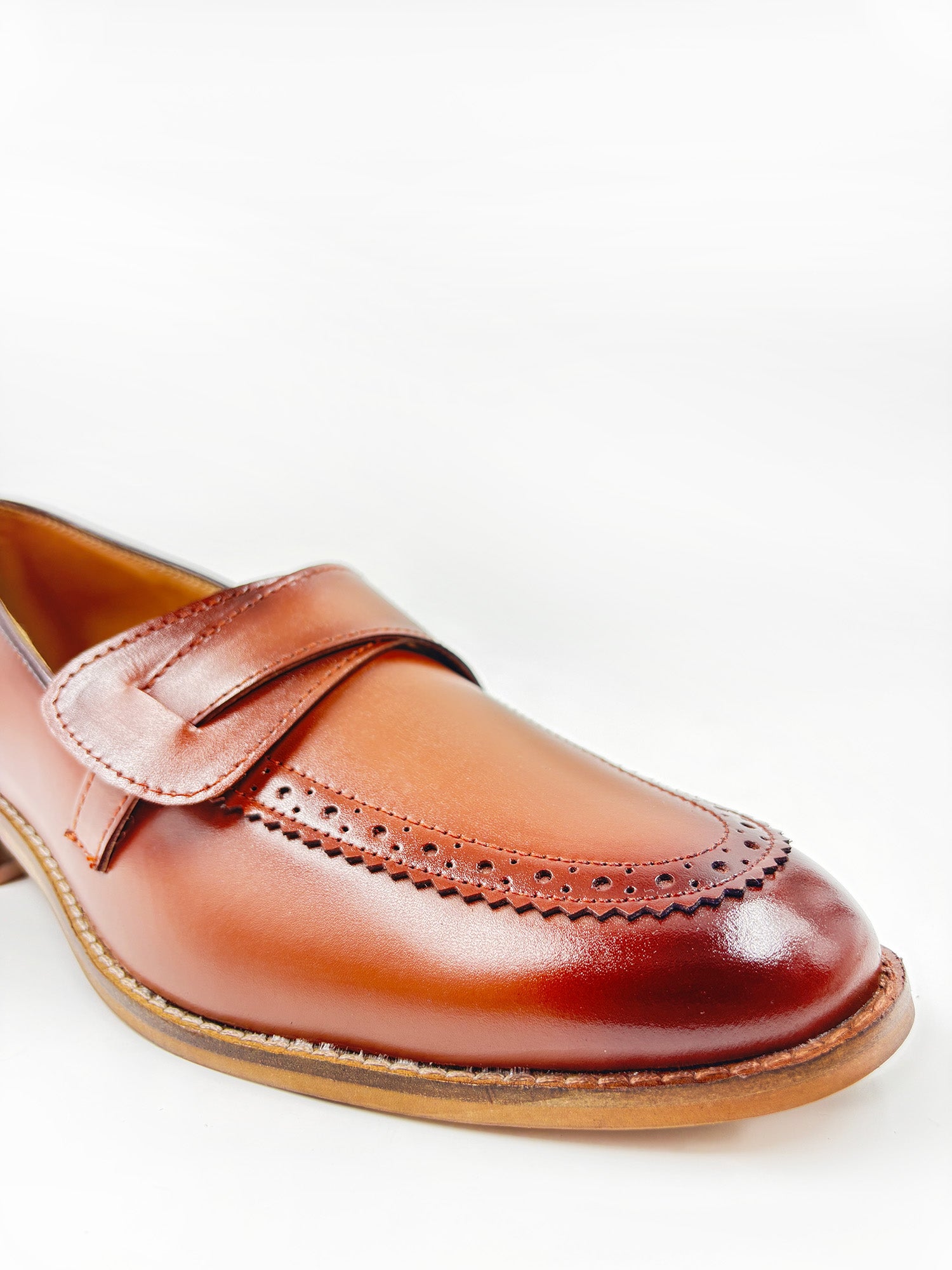 Brown leather penny loafers on mid heel