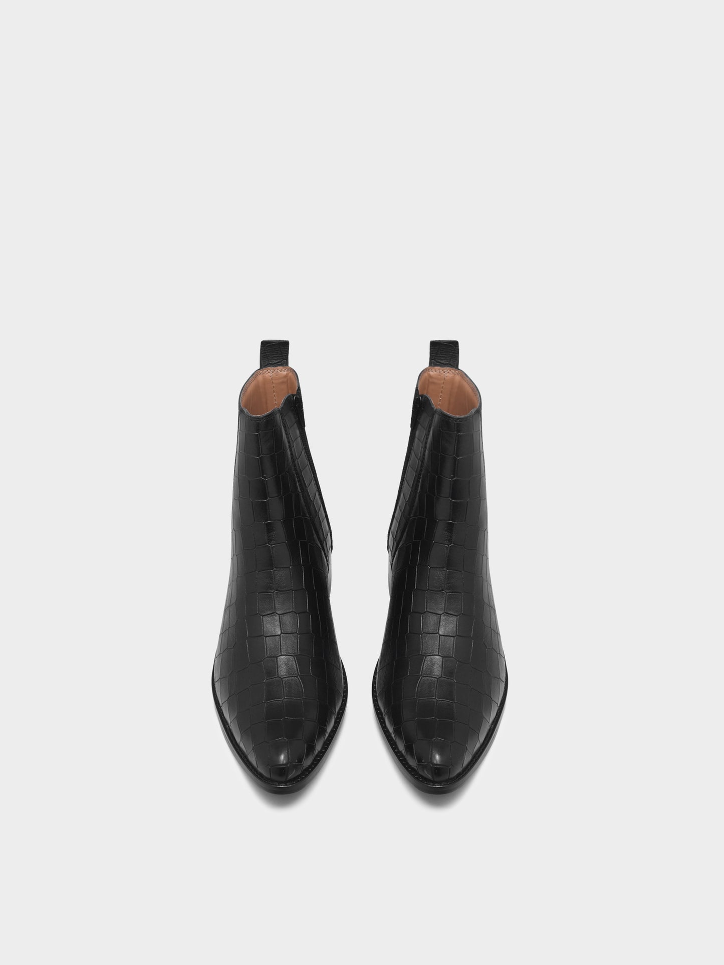 Men’s black crocodile-textured leather Chelsea boots with a sleek, pointed toe design