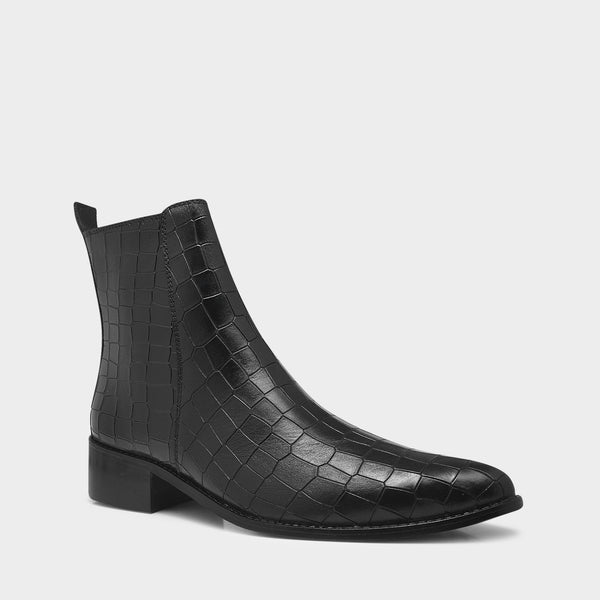 Men’s black crocodile-textured leather Chelsea boots with a sleek, pointed toe design