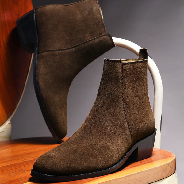 A men's luxury suede leather Chelsea boot with a cuban heel and zip side panels, in a brown color.