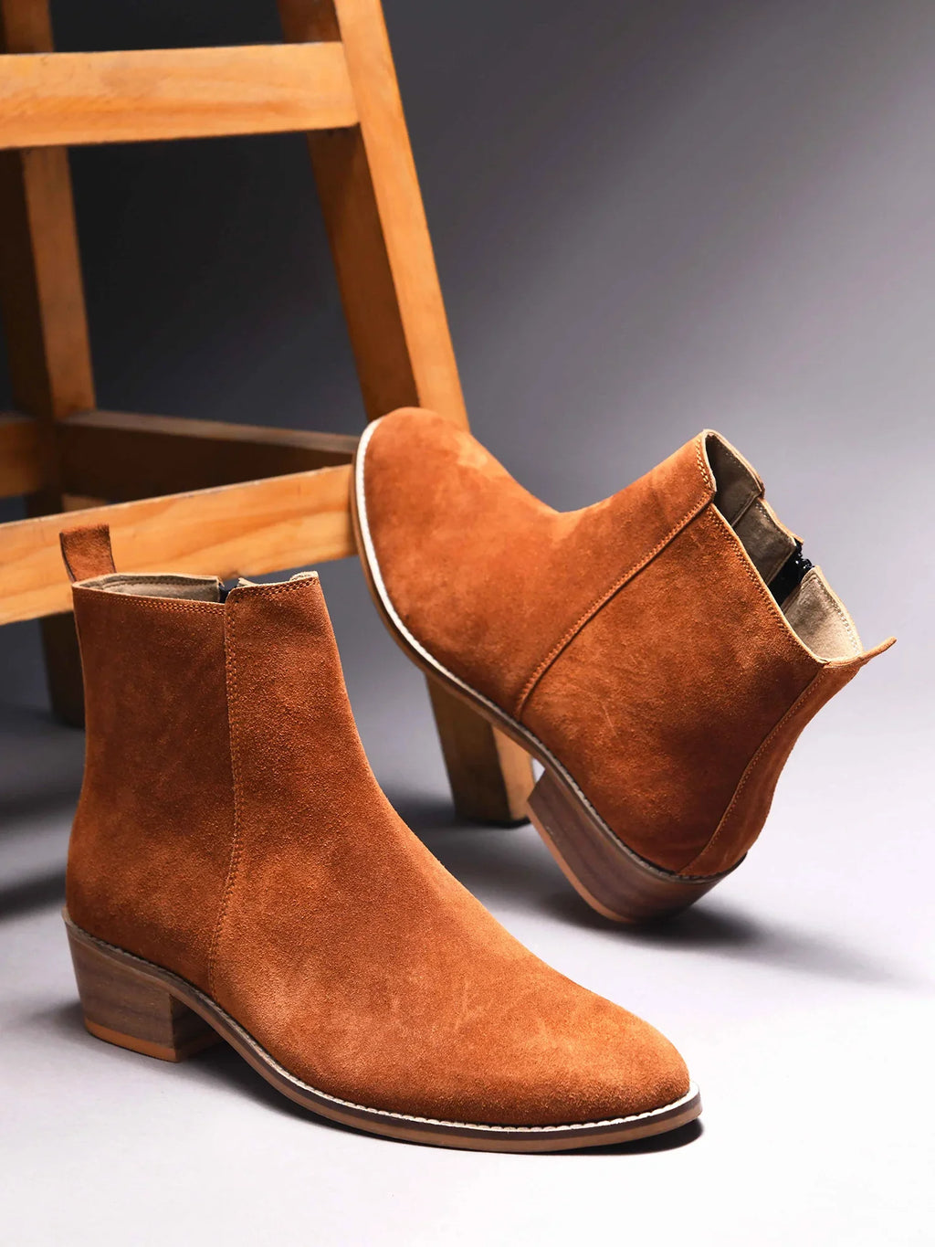 Preview of A men's luxury suede leather Chelsea boot with a cuban heel and zip side panels, in a tan color.