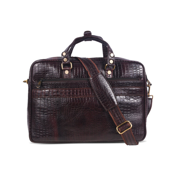 Brown crocodile skin messenger bag with gold accents 