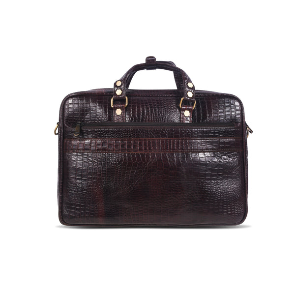 Brown crocodile skin messenger bag with gold accents 