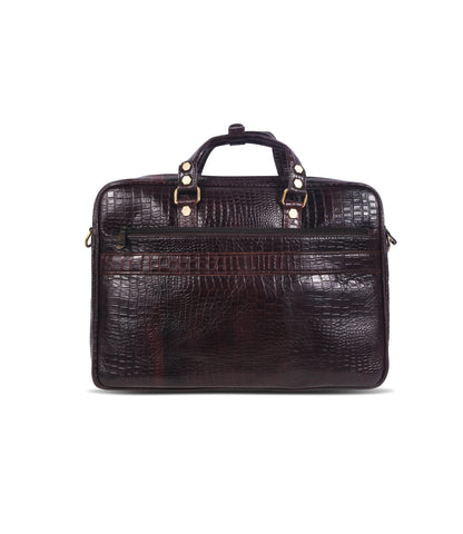 Brown crocodile skin messenger bag with gold accents 