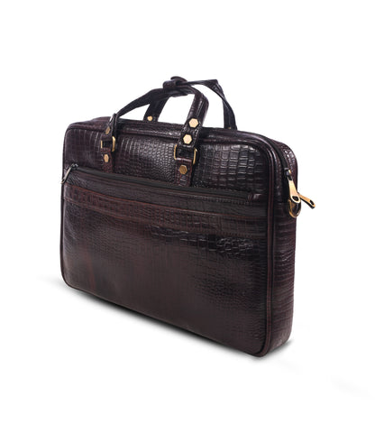 Brown crocodile skin messenger bag with gold accents 