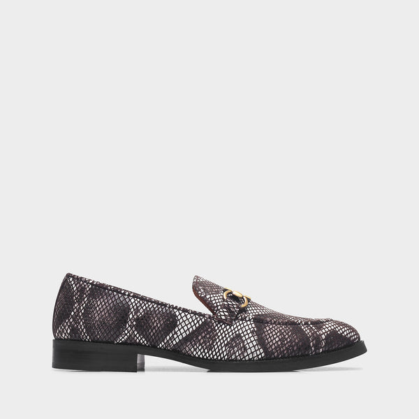 Brown and white snake-patterned penny loafer shoe on mid heel with a horsebit buckle