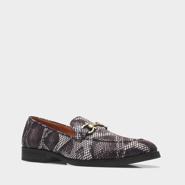 Brown and white snake-patterned penny loafer shoe on mid heel with a horsebit buckle