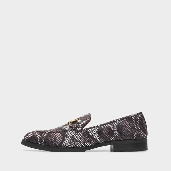 Brown and white snake-patterned penny loafer shoe on mid heel with a horsebit buckle