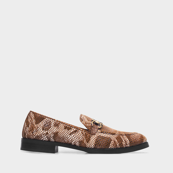 Brown snake-patterned penny loafer shoe on mid heel with a horsebit buckle