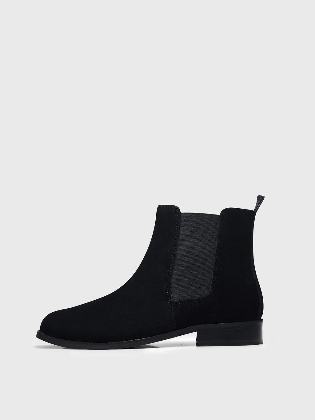 Preview of A men's luxury suede leather Chelsea boot with a mid heel and elastic side panels, in a black color.