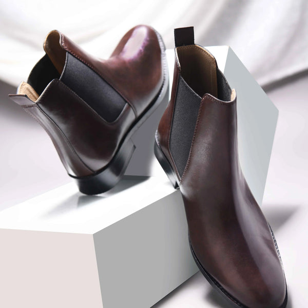 Brown leather Chelsea boot with side elastic and mid heel