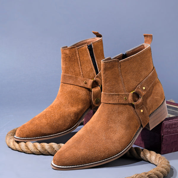 Pair of tan suede boots on Cuban heel with tan coloured buckle on side with golden accents