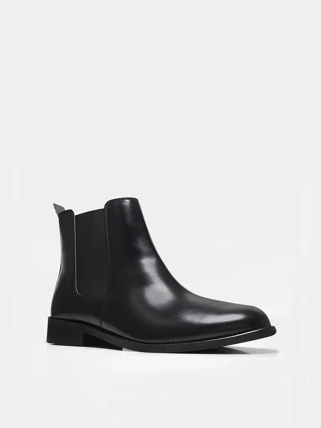 Preview of Black leather boots with side elastic and mid heel