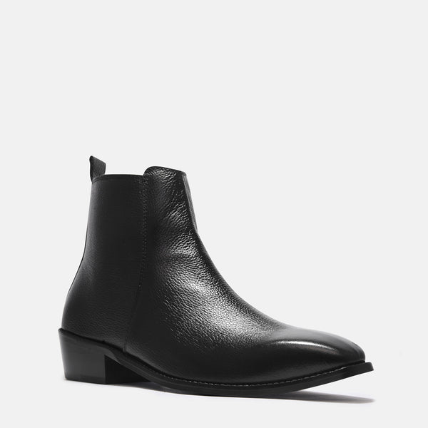 A men's leather side zip boot with a cuban heel, primarily black in color.