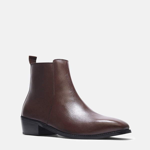 A brown, side zip leather boot with a cuban heel for men.
