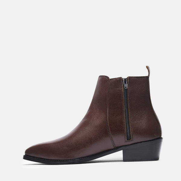 A brown, side zip leather boot with a cuban heel for men.