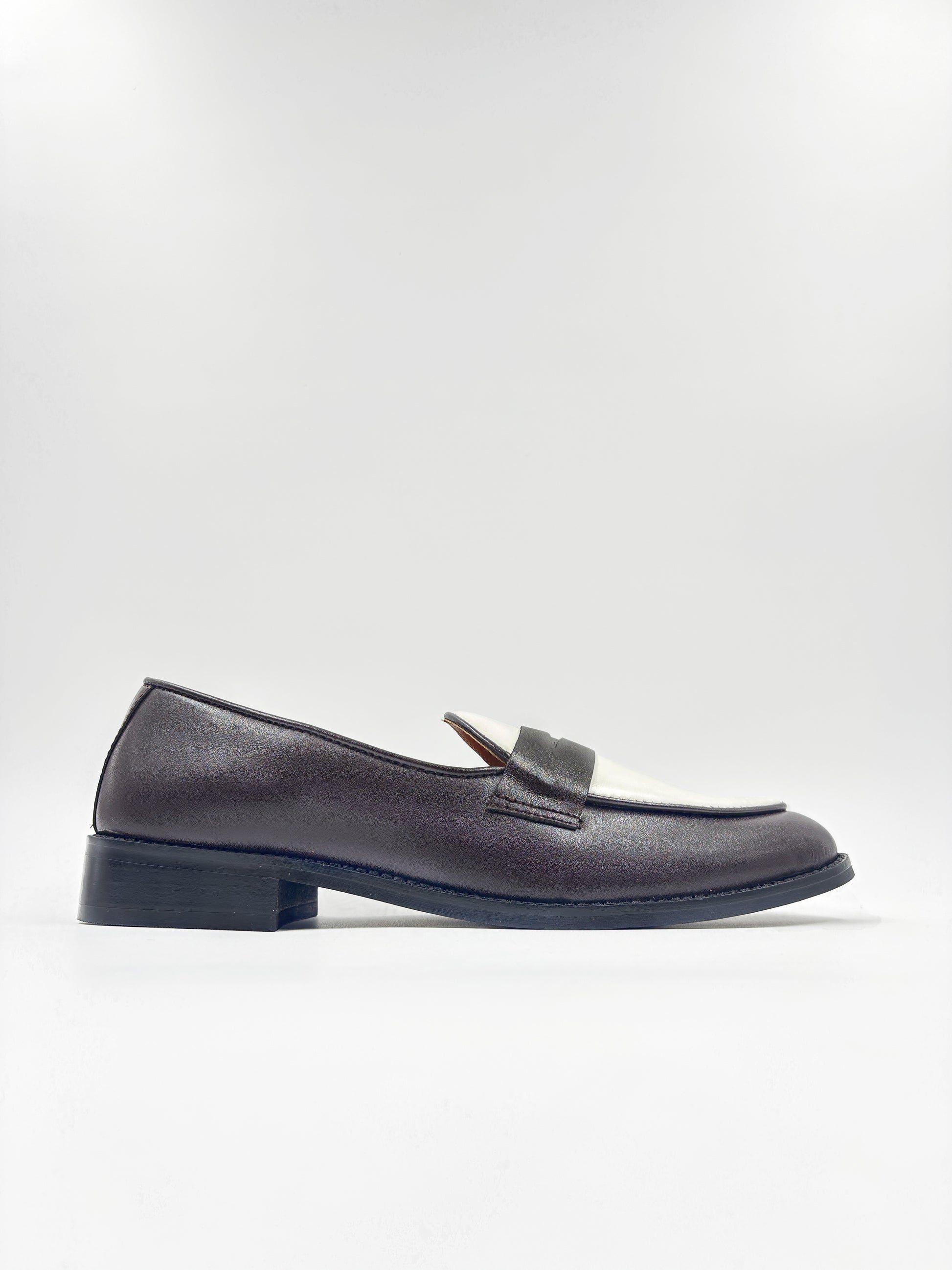 Brown and white leather loafers on a mid heel 