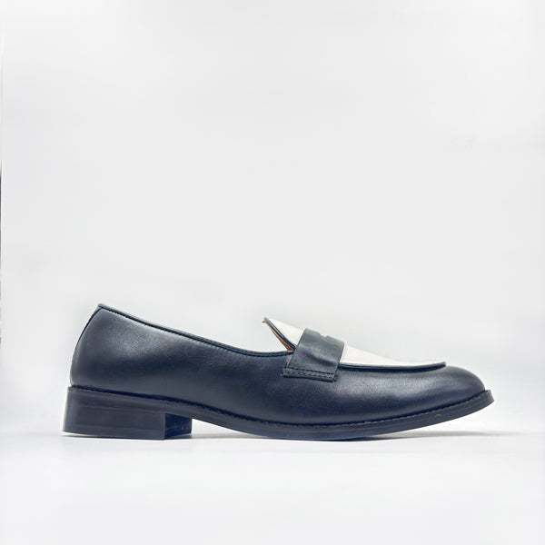 Black and white leather loafers on a mid heel 