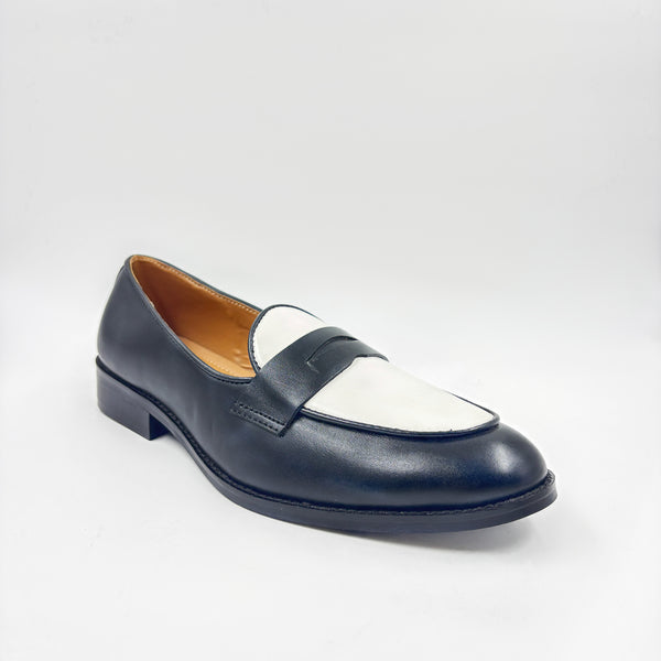 Black and white leather loafers on a mid heel 