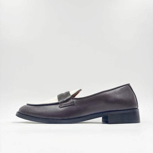 Brown and white leather loafers on a mid heel 