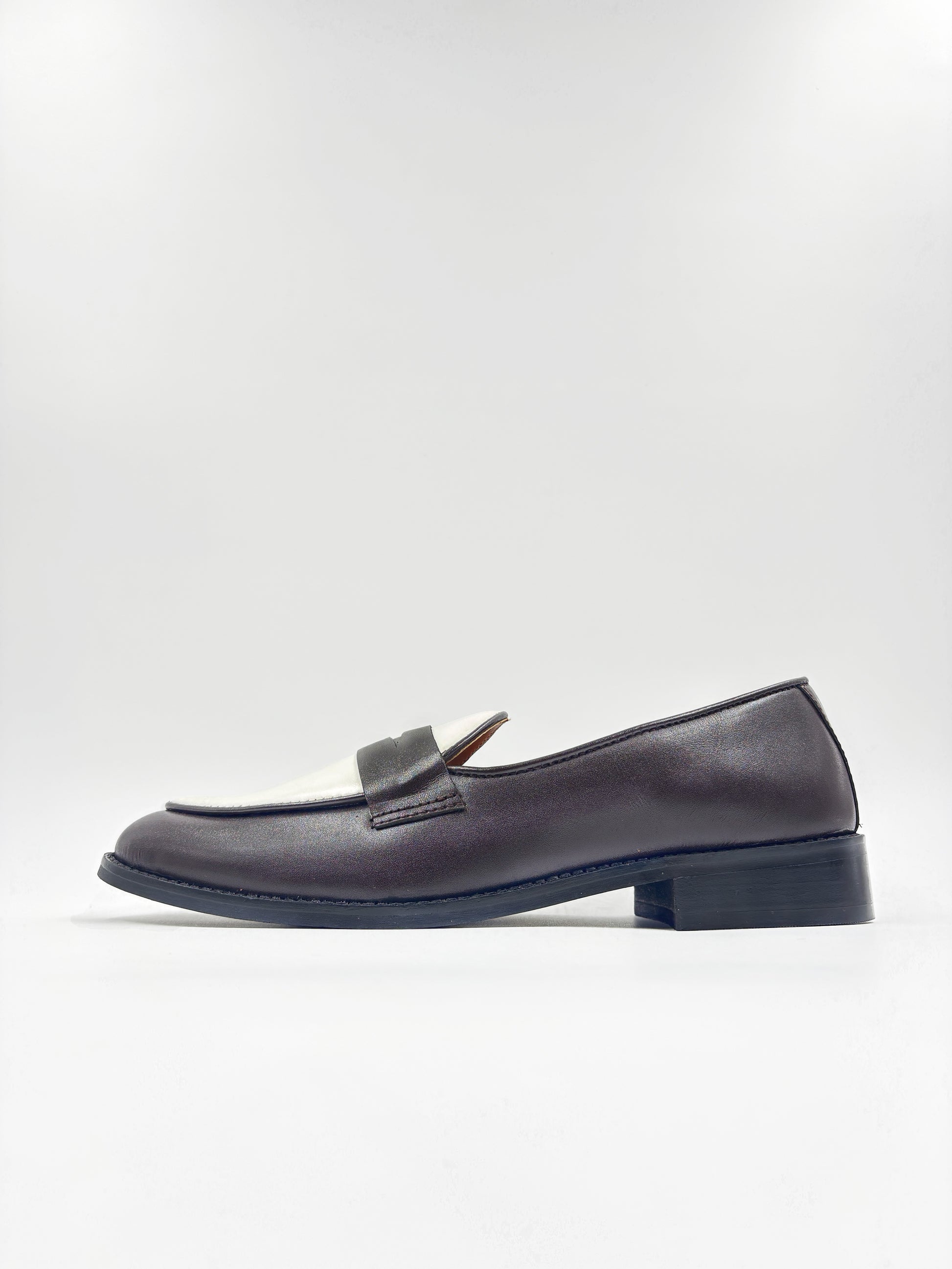Brown and white leather loafers on a mid heel 