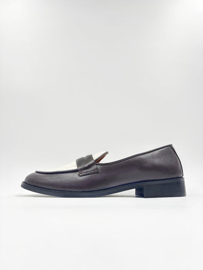 Brown and white leather loafers on a mid heel 