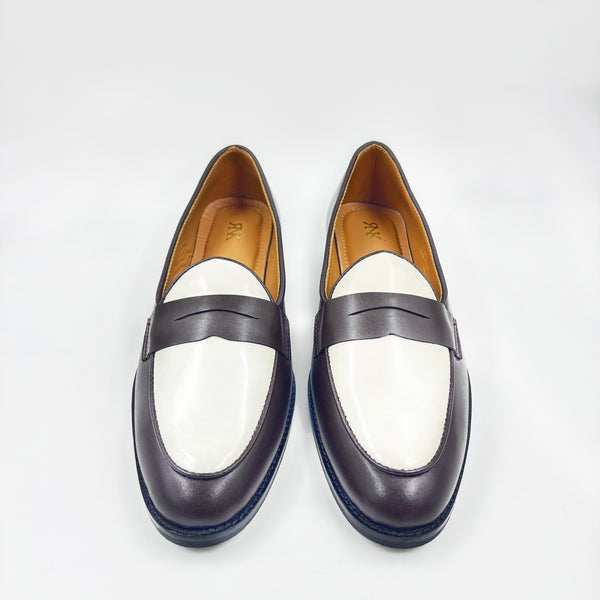 Brown and white leather loafers on a mid heel 