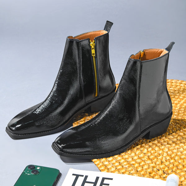 Pair of a Black patent leather boots with side zipper on a Cuban heel