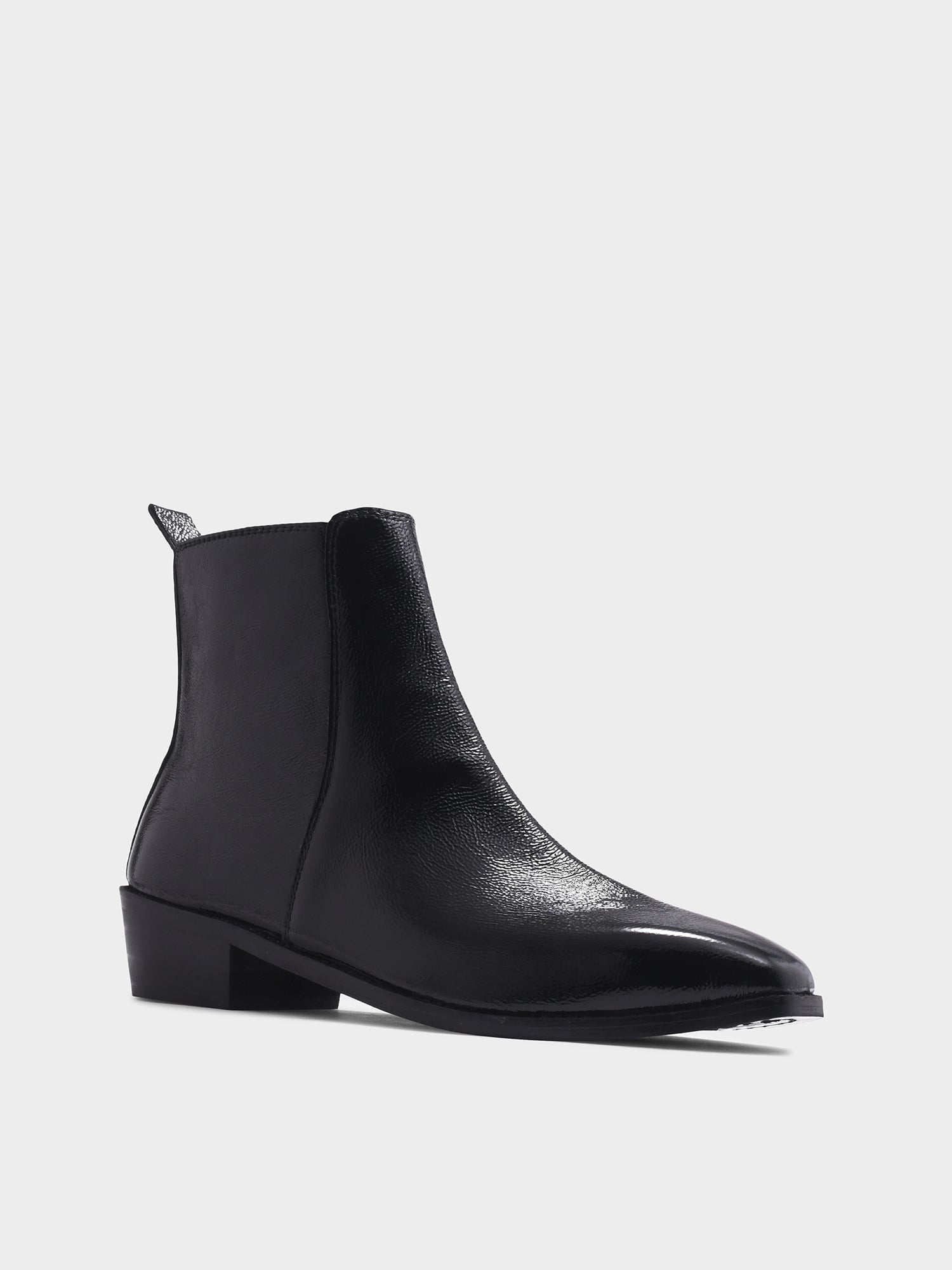 Black patent leather boots with side zipper on a Cuban heel