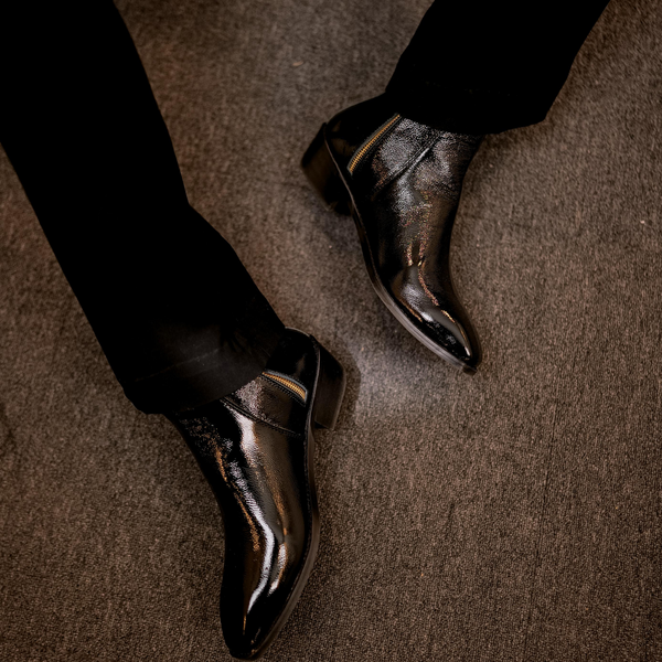 Close-up of a black patent boot named Knight walker designed b RNK Luxe