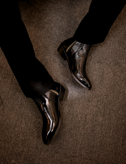 Close-up of a black patent boot named Knight walker designed b RNK Luxe