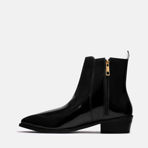 A man's patent leather boot in black or a Cuban heel