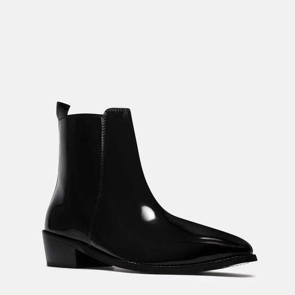 A man's patent leather boot in black or a Cuban heel