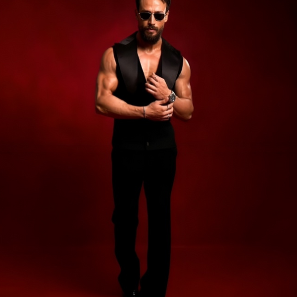 Tiger Shroff styling with LOKI, The black patent boot made by RNK Luxe
