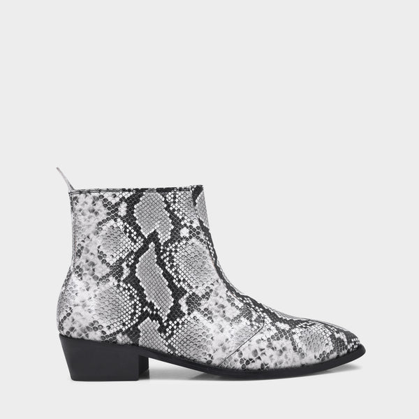 A pair of black and white snake printed leather boot with square toe and a black colour Cuban heel