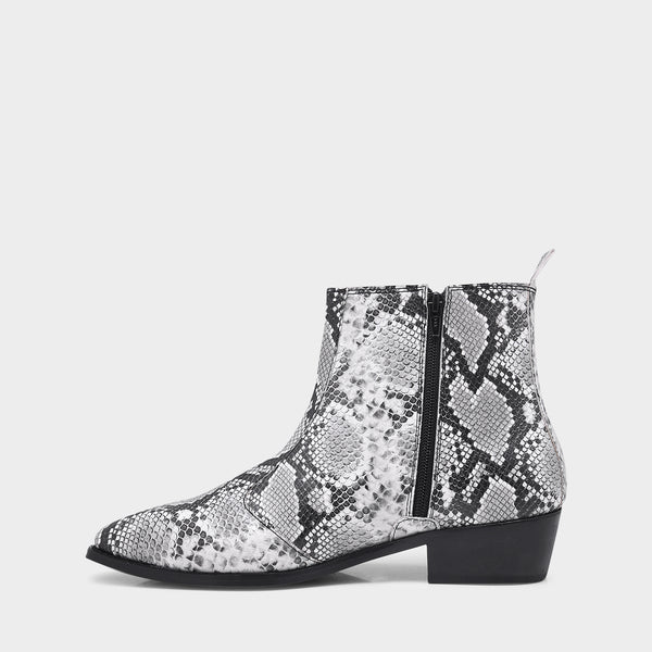 A black and white snake printed leather boot with square toe and a black colour Cuban heel