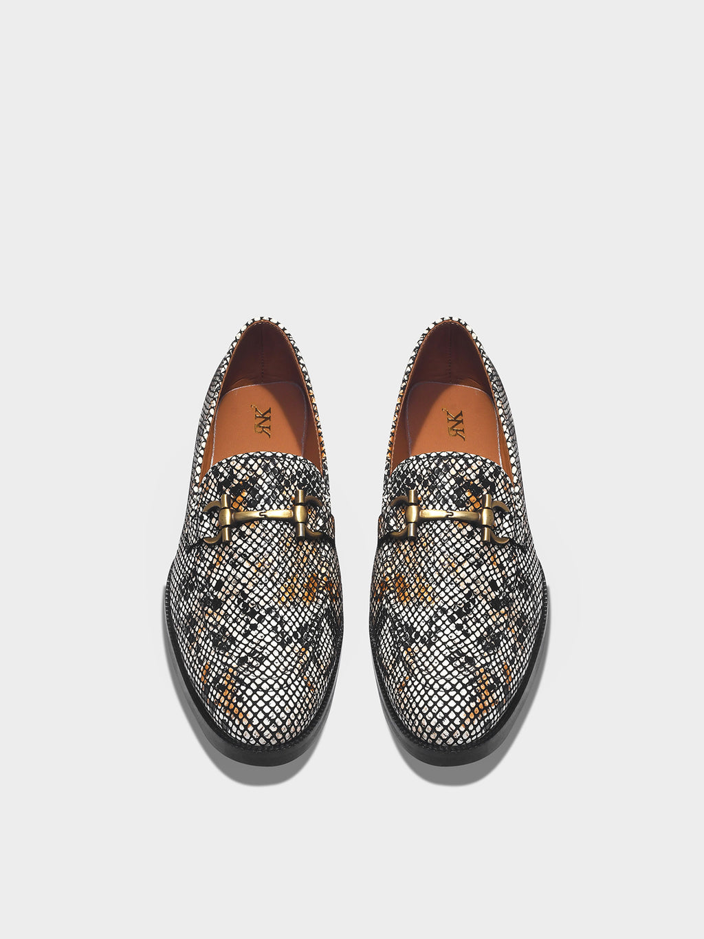 Preview of Pair of patterned loafers with a horsebit buckle 