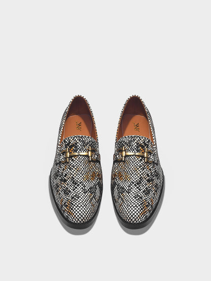 Pair of patterned loafers with a horsebit buckle 