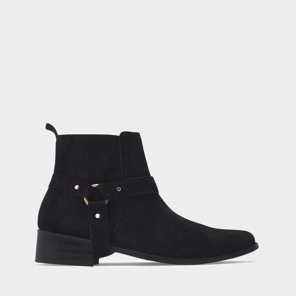 Phantom black suede harness boots for men featuring a pointed toe, side zip closure, and attached leather thong strap – luxury ankle boots by RNK Luxe for bold, stylish looks.