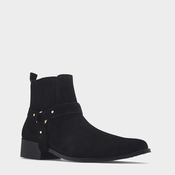 Phantom black suede harness boots for men featuring a pointed toe, side zip closure, and attached leather thong strap – luxury ankle boots by RNK Luxe for bold, stylish looks.