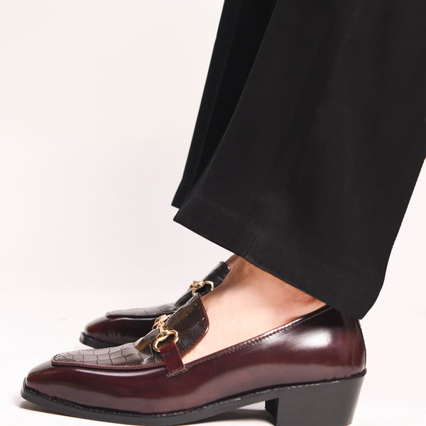 A pair of cherry leather loafer in which it embossed with brown croco leather on top with a golder horesit buckle
