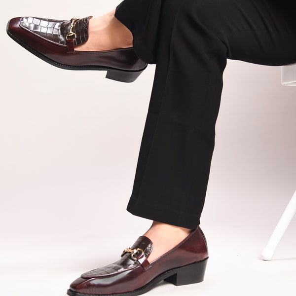 A pair of cherry leather loafer in which it embossed with brown croco leather on top with a golder horesit buckle