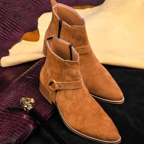 Pair of tan suede boots on Cuban heel with tan coloured buckle on side with golden accents