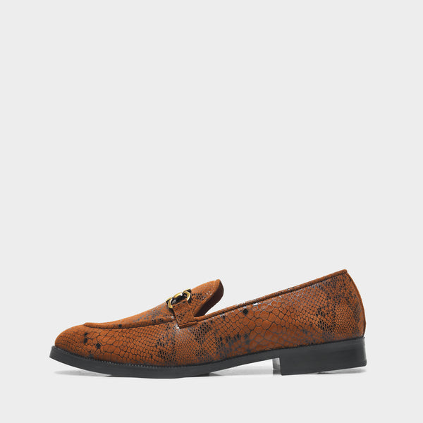 Brown snake-patterned penny loafer shoe on mid heel with a horsebit buckle